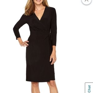 Slimming black knee length dress